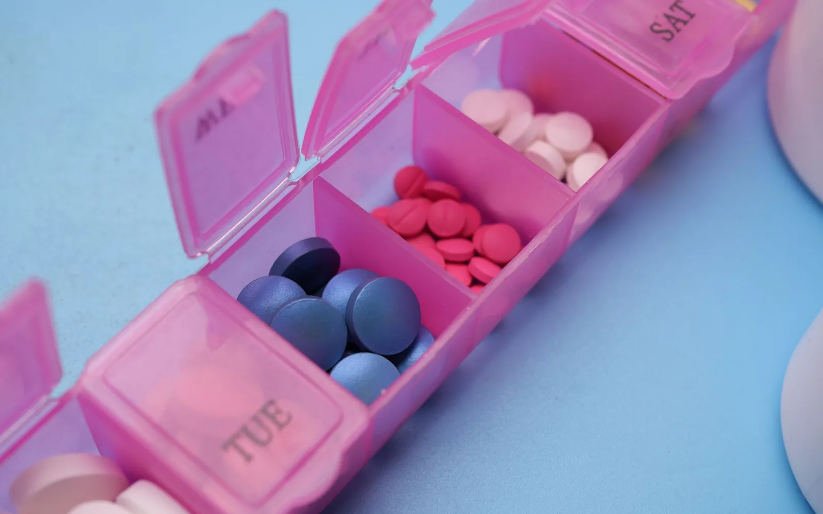A weekly medication organizer representing a consistent antidepressant treatment timeline